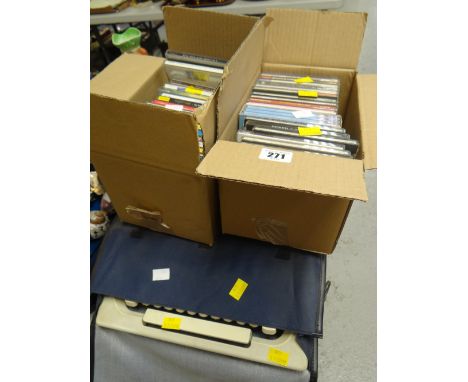 A quantity of CDs & a vintage typewriter