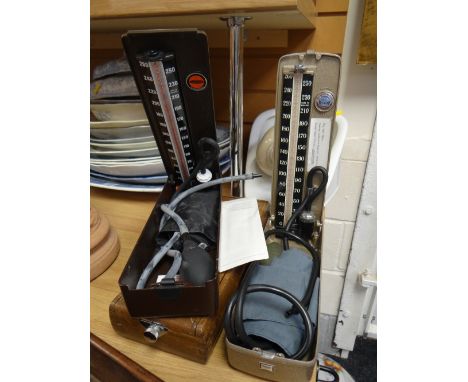 Three vintage blood pressure gauges