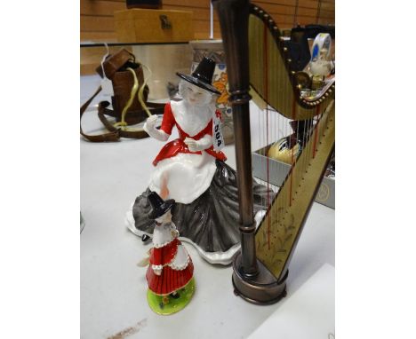 A Royal Doulton figure 'Y Gymraes - Welsh Lady HN4968' together with 'Harp' & another novelty Welsh costumed figure