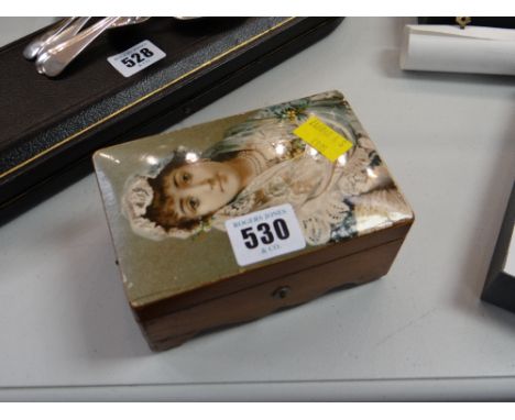 A charming portrait miniature musical box