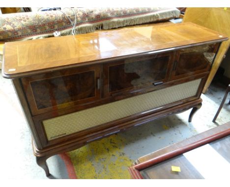 A vintage 'Hungarian Rhapsody' polished walnut record player / radiogram cabinet