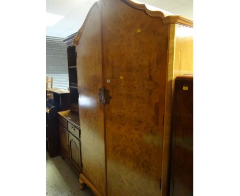 A two-door polished vintage wardrobe