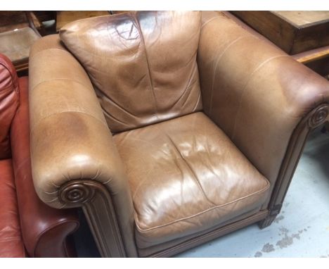 A modern light brown leather & wooden framed club-style armchair