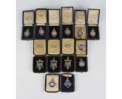 A collection of George V silver and enamelled fob medals, all dating from the 1930's and awarded to R.A. Scott, to include Be