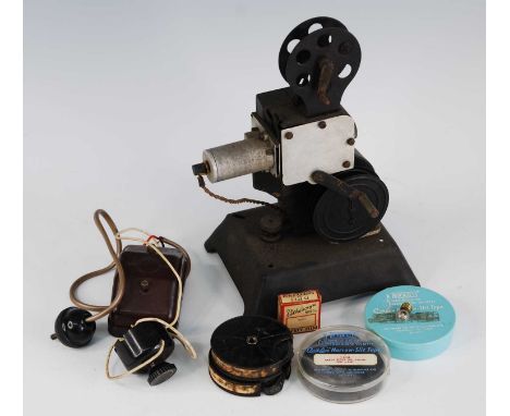 An early 20th century Bingoscope 9.5mm projector, with bakelite transformer and film reels to include Mickey Mouse The Cats o