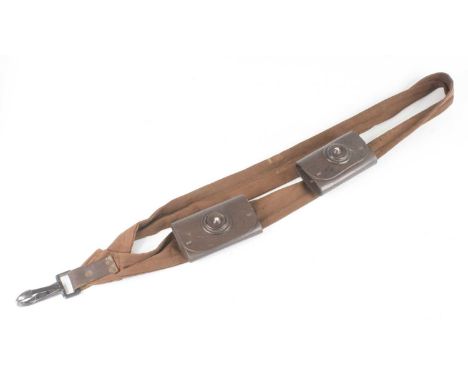 Planet Of The Apes, a shoulder sash, of canvas construction with steel clip and two brown leather pouches, L.82cm.