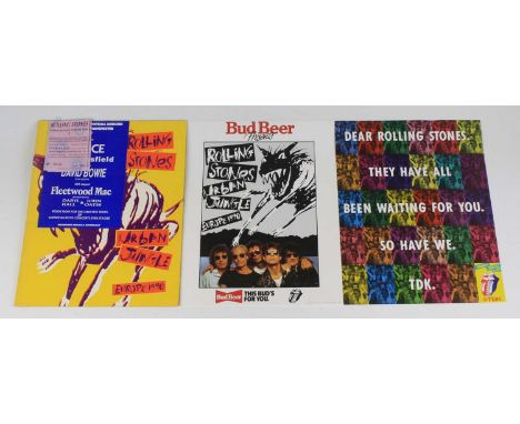 A collection of concert tour programmes to include the Rolling Stones, European Tour '82 with sticker and two ticket stubs fo