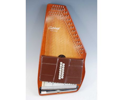 An Oscar Schmidt C Series Autoharp, in carry case with tuning fork and paperwork, together with a German Sohengun Autoharp, i