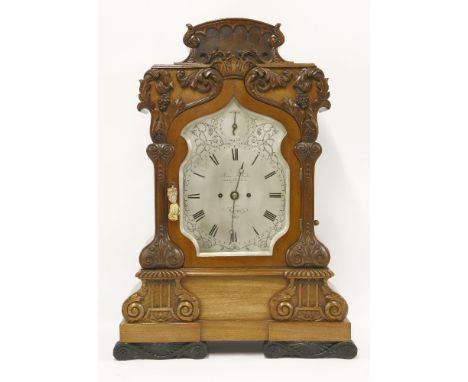 A Regency mahogany bracket clock, by James McCabe, Royal Exchange London, the silvered dial with a strike/silent dial, scroll