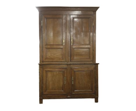 A French 'Buffet Deux Corps',18th century, the upper section with a moulded cornice over a pair of double panelled doors, the