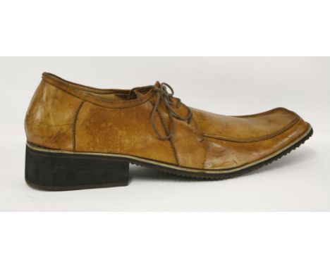 A large display shoe in brown leather,bears label 'K. Footwear London Ltd.',65cm long