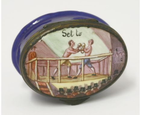 A rare oval enamel patchbox,early 19th century, the lid with a boxing scene, including the wooden ring and crowd, inscribed '