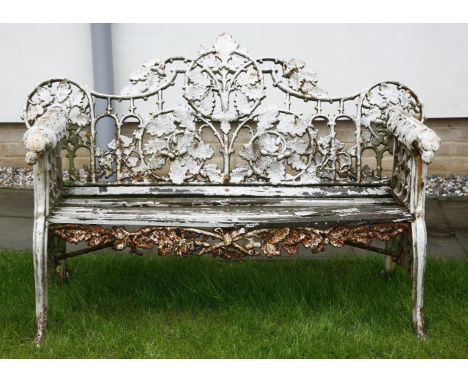 A Coalbrookdale design cast iron garden bench,in the 'Oak and Ivy' pattern with a wooden slatted seat,150cm wide