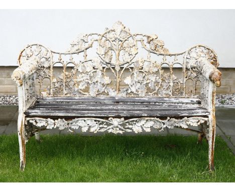 A Coalbrookdale design cast iron garden bench,in the 'Oak and Ivy' pattern, with a registration lozenge and a wooden slatted 