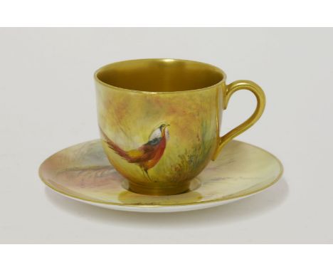 A Royal Worcester Cabinet Cup and Saucer,1933, each piece painted by James Stinton, signed, with a colourful pheasant, interi