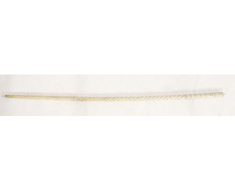 A carved whalebone walking stick,late 19th century, with part spiral turned, carved shaft,79cm long