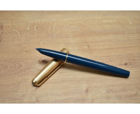 A Parker 51 Custom aerometric fill fountain pen in teal with a rolled gold cap