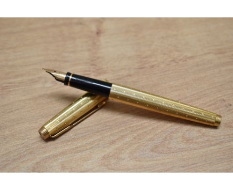 A Parker 75 Perle converter fill fountain pen in rolled gold.