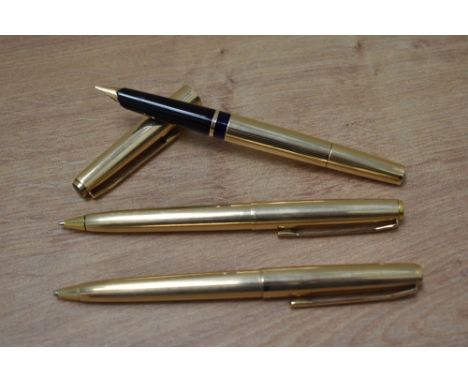 A Pelikan M60 Rolled gold plunger fill fountain pen, ballpoint pen and mechanical pencil set.