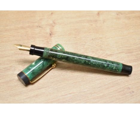 A Parker Duofold Special Lucky Curve button fill fountain pen in jade green with two narrow bands to the cap having a Parker 