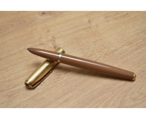 A Parker 51 aerometric fill fountain pen in mustard with a rolled gold cap having twin jewel cap