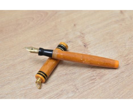 A Mabie Todd Swan 172/51 Self Filling lever fill fountain pen in tangerine with two narrow gold bands on black and two black 