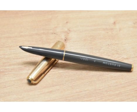 A Parker 61 Custom capillary fill fountain pen in grey with rolled gold cap. Parker chalk marks present