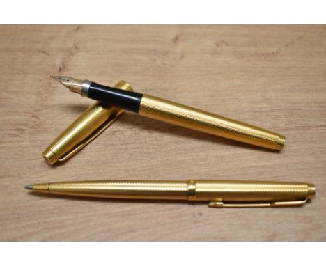 A Parker 75 Grain d'Orge aerometric fill fountain pen and ballpoint pen set in rolled gold. engraved