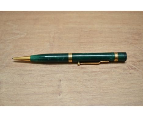 A Mabie Todd Fyne Poynt propelling pencil in dark jade green with two ribbed rings