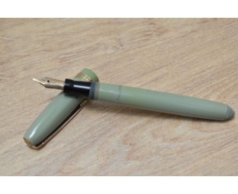 A Mabie Todd &amp; Co Swan Calligraphy twist fill fountain pen in pastel green having Swan 2 K 14ct 585 nib