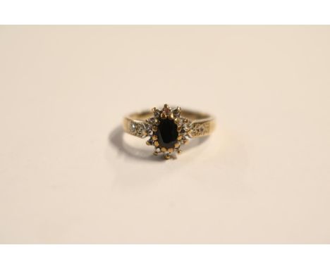 Ladies 9ct Gold Sapphire &amp; Diamond Cluster ring Size K. 2.5g total weight 