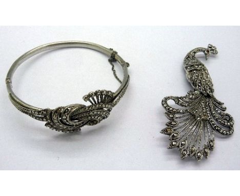 A silver and marcasite brooch and a bangle