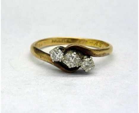An 18ct gold and three stone diamond ring, weight 2.0g, size Q