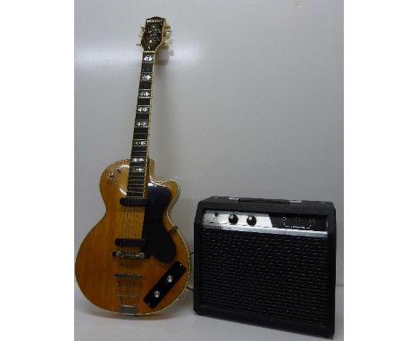 A Hofner electric guitar, cased with a Crestone amplifier