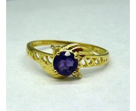 A 9ct gold, amethyst and diamond ring, weight 1.0g, size O