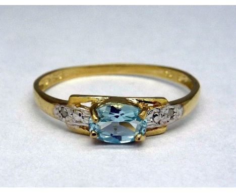 A 9ct gold, aquamarine and diamond ring, weight 1.0g, size O