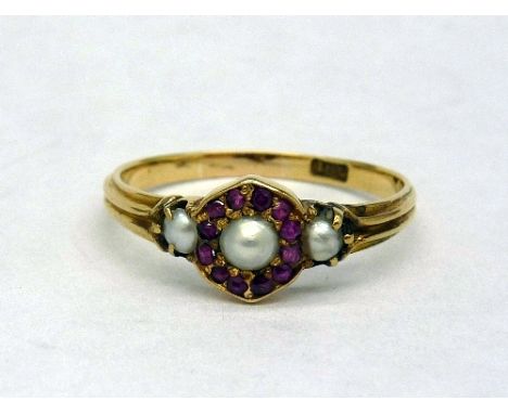 An 18ct gold, pearl and ruby ring, weight 2.4g, size Q