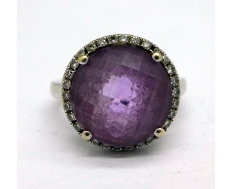 An 18ct white gold, faceted amethyst and diamond cluster ring, set with thirty diamonds, weight 6.3g, size M, with certificat