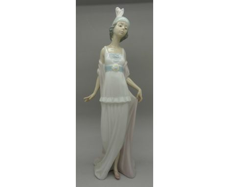 A Lladro figure, 5788, Talk of The Town, boxed, height 26cm
