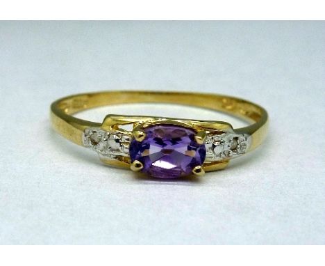 A 9ct gold, amethyst and diamond ring, weight 1.0g, size O