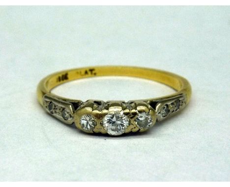 An 18ct gold and diamond ring, weight 2.9g, size R