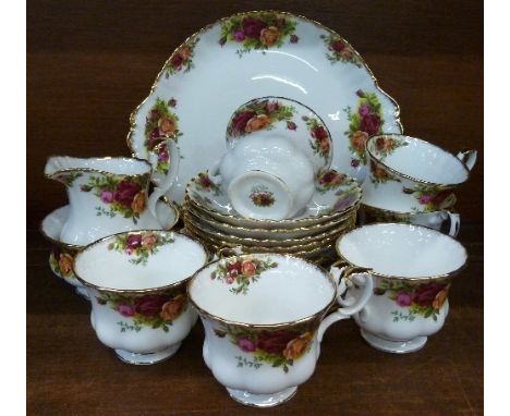 Royal Albert Old Country Roses teaware, twenty-one pieces in total comprising six cups, saucers and side plates, a cream jug,