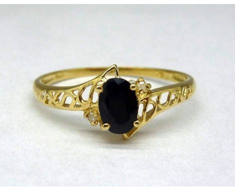 A 9ct gold, sapphire and diamond ring, weight 1.0g, size O