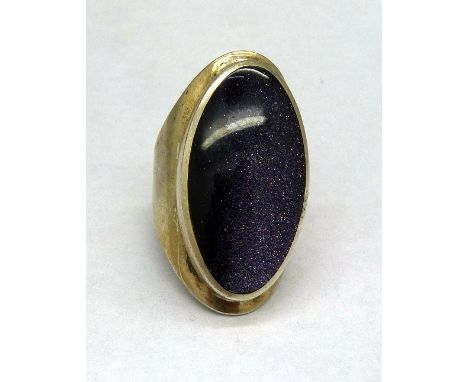 A contemporary silver and blue stone ring, maker OSW, size O