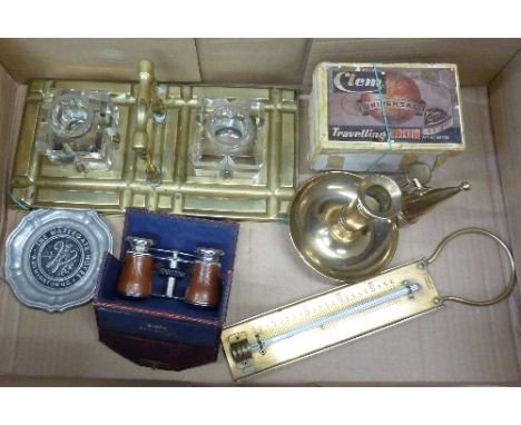 A brass ink stand with two glass ink wells, width 27.5cm, a brass chamberstick, a Clem Universal travel iron, boxed, a pair o