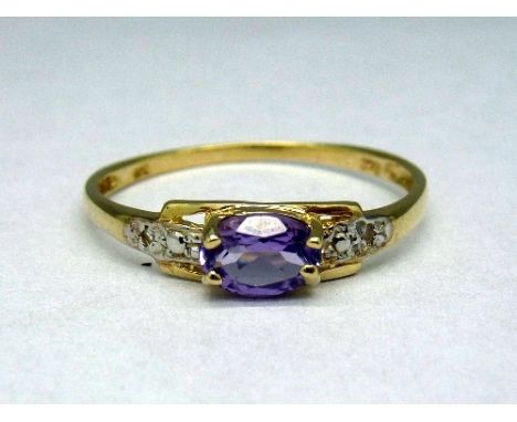 A 9ct gold, amethyst and diamond ring, weight 0.7g, size O