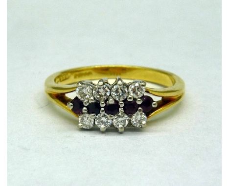 An 18ct gold, ruby and diamond ring, weight 4.2g, size O
