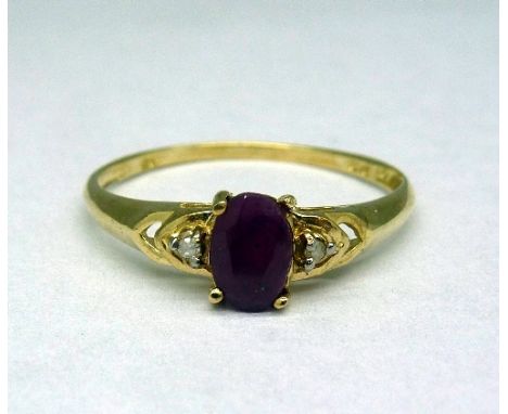 A 9ct gold, ruby and diamond ring, weight 0.9g, size N