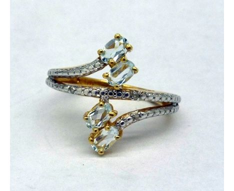 A silver gilt, aquamarine and diamond ring, size P