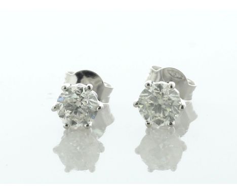 Two round brilliant cut diamonds set in an 18ct white gold six claw basket style earring.  Each diamond measures 5.mm in widt